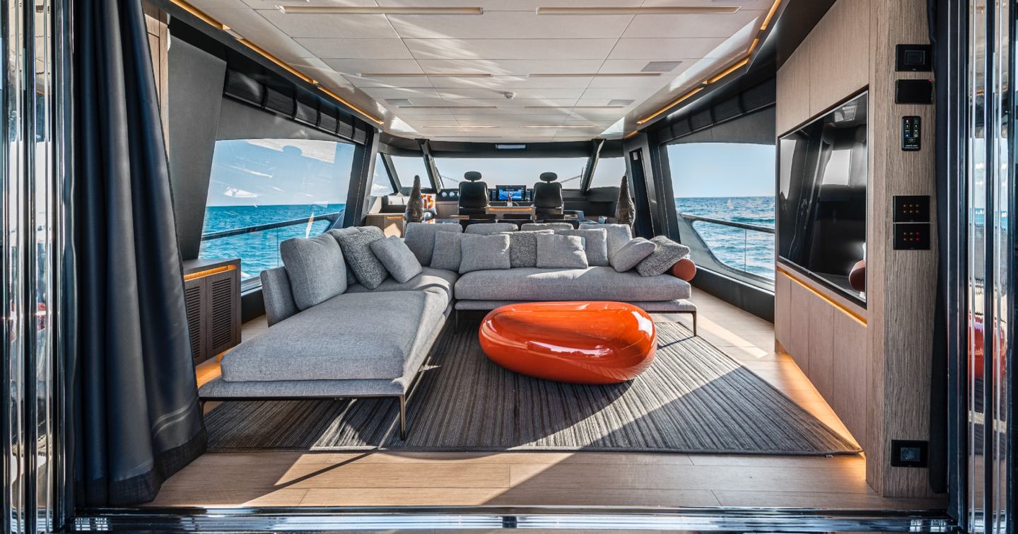 AB Yachts AB 80 Motor Yacht main saloon with grey L-shaped sofa