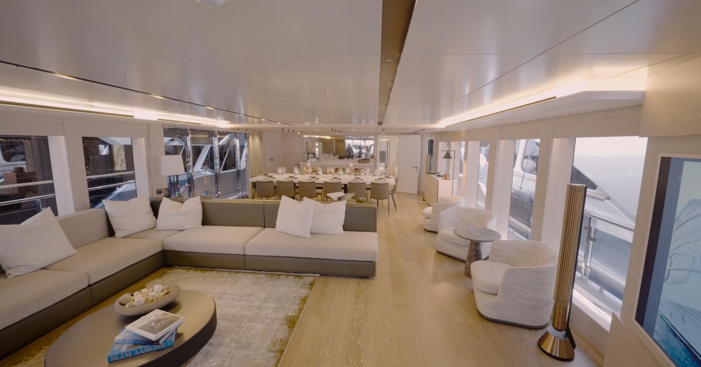 Numarine 40MXP main saloon with lounge, formal dining area and full-height glazing