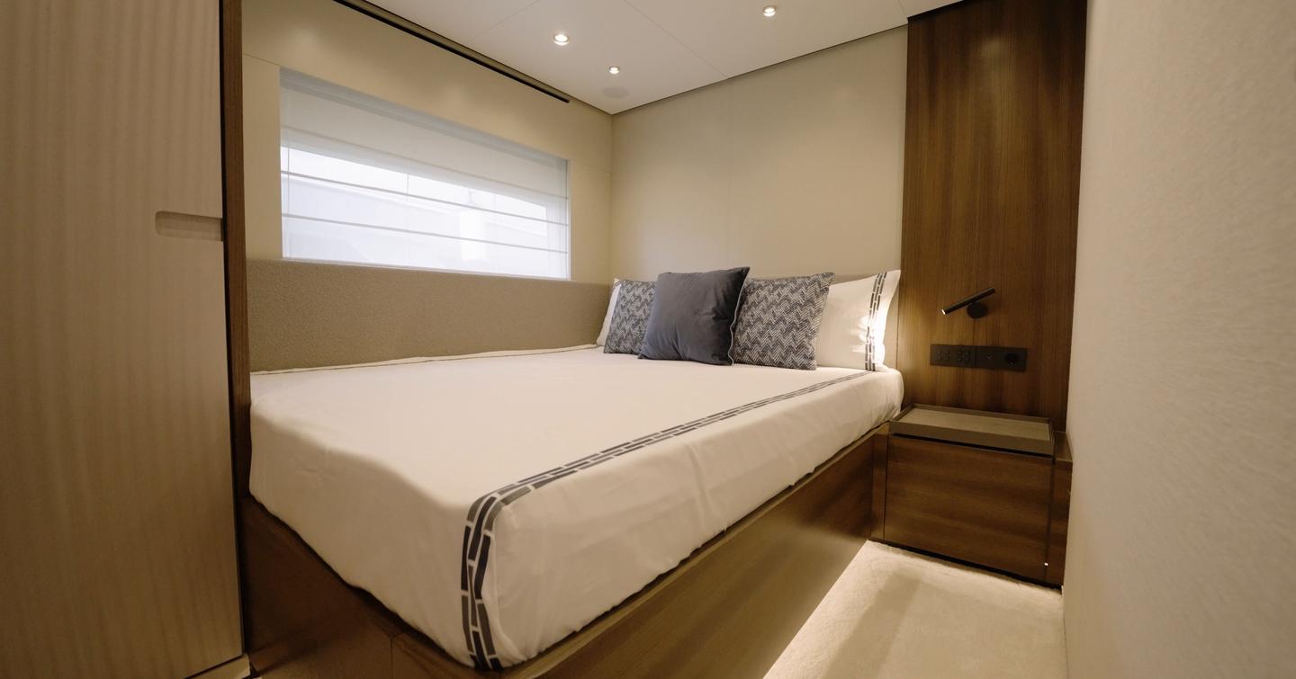 Manda S07 Berlinetta double guest cabin with full size berth and integrated bedside storage