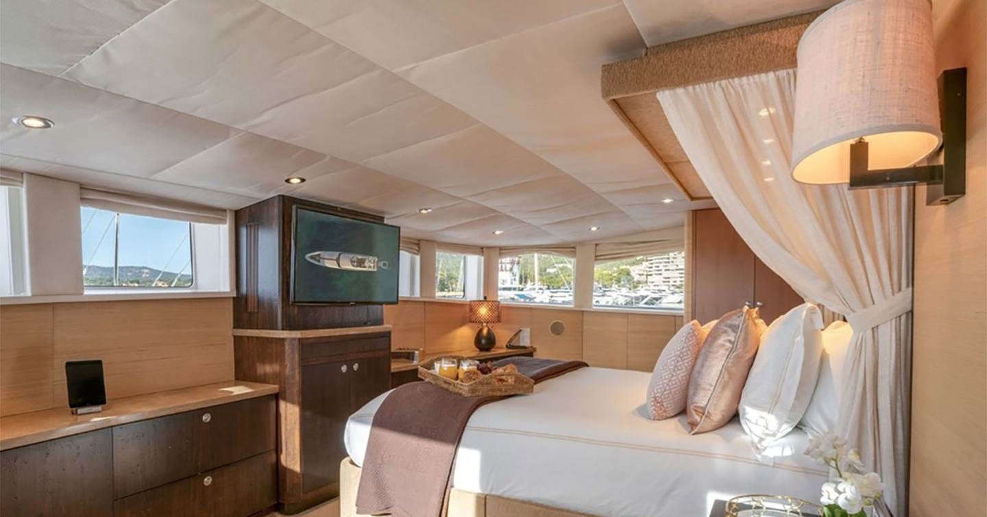 Superyacht Envy's owner's suite with mounted TV