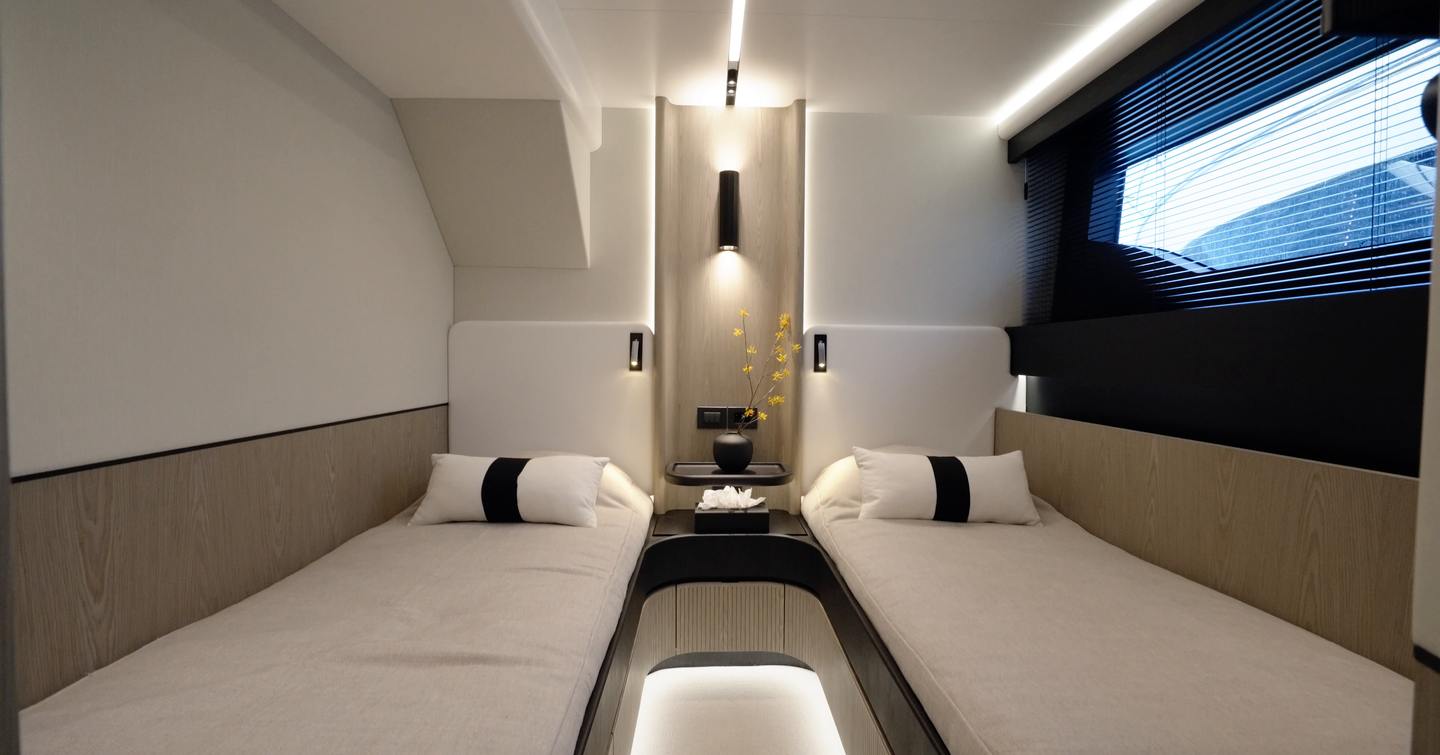 Pearl 73 twin guest cabin with two single berths and hull window
