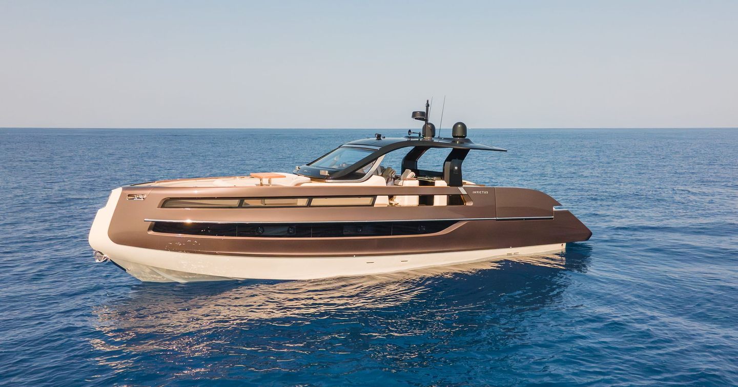 Invictus TT550 motor yacht at anchor