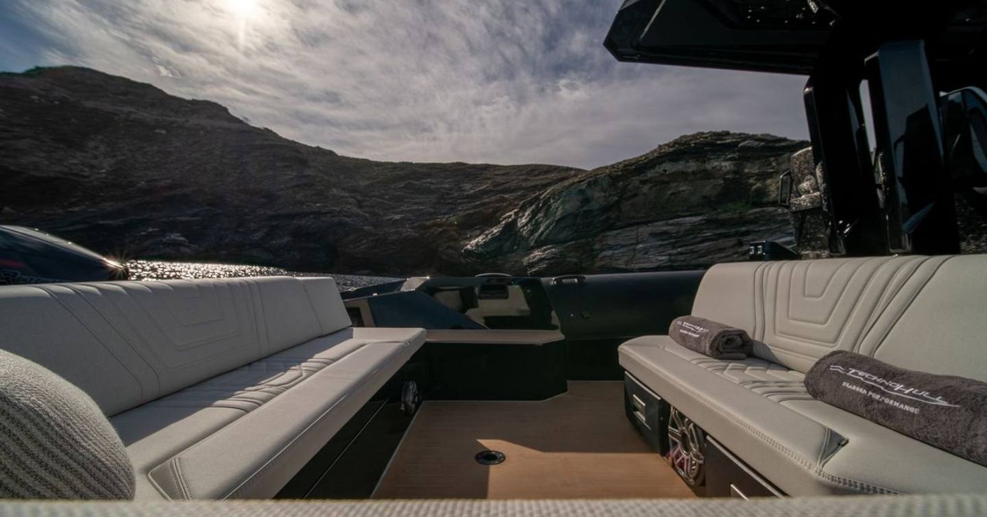 Technohull Alpha 45 dayboat aft U-shaped white seating