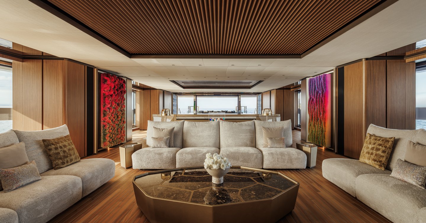 Sanlorenzo 74Steel superyacht Silver Fox salon with white sofas and pink artwork 