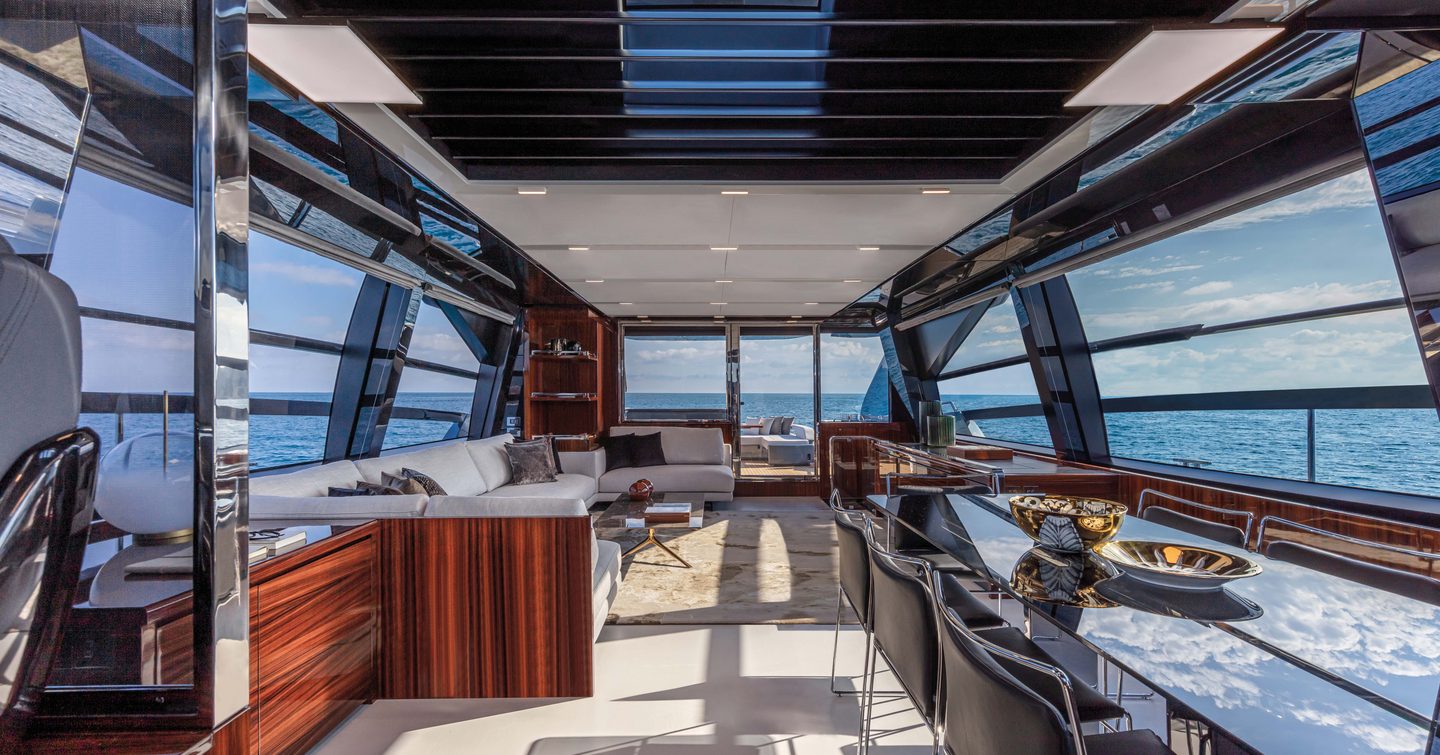 With its large windows and glass door, the 88' Folgore's salon offers a panoramic ocean view.