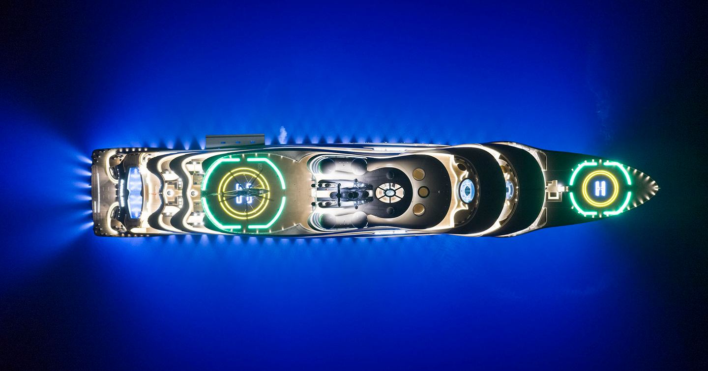 Aerial view of Superyacht Flying Fox at night lit up