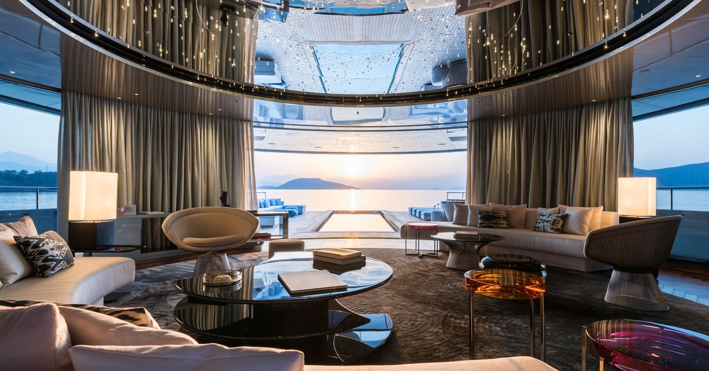 Superyacht Savannah main saloon with starry night ceiling and curved seating