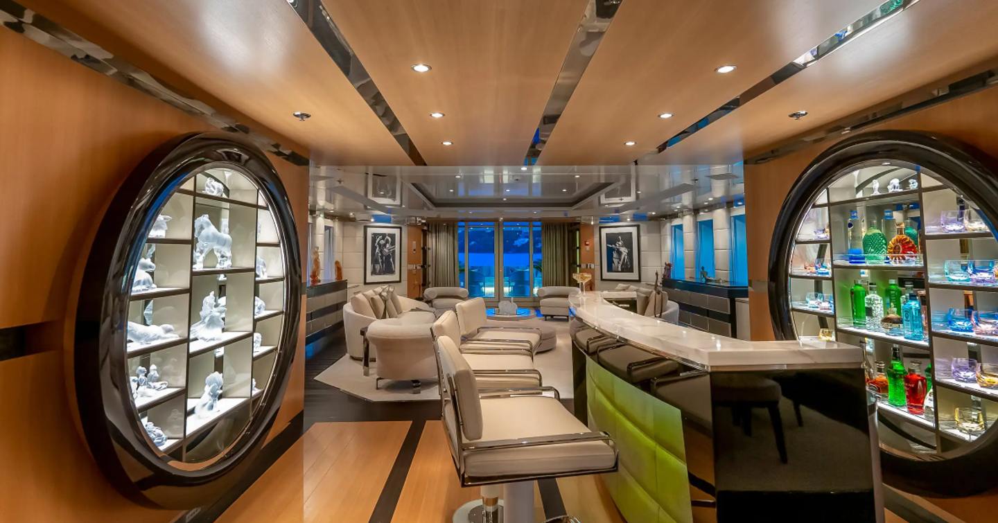 Abeking & Rasmussen Superyacht Scott Free interior bar area with white stools 