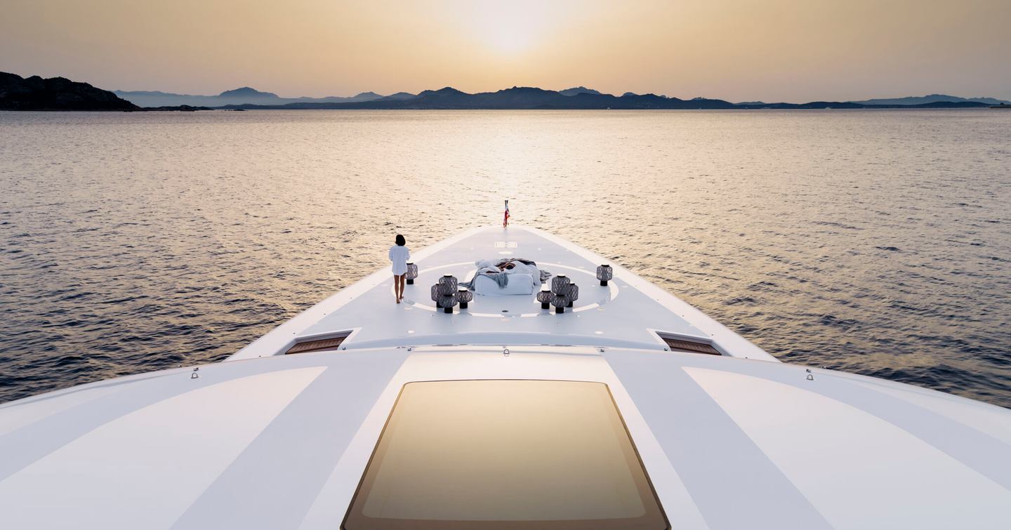 Woman on the bow of Oceanco H3 Superyacht