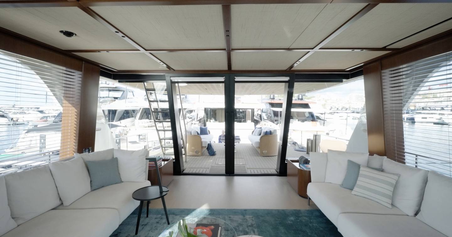 Sanlorenzo SHE saloon looking aft through curved glazing to the cockpit