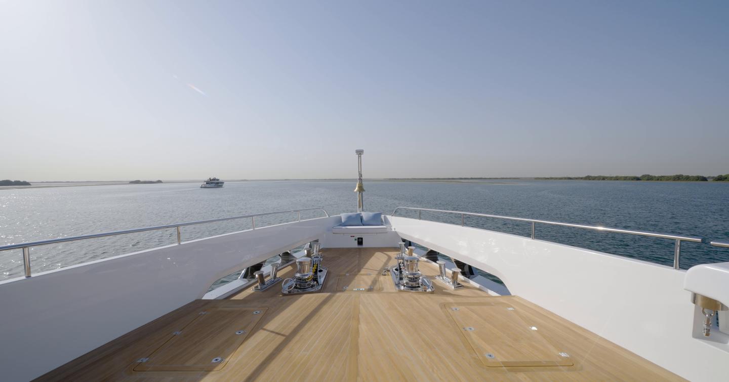 Foredeck of the Gulf Craft Majesty 145 with twin anchor winches and tender stowage area