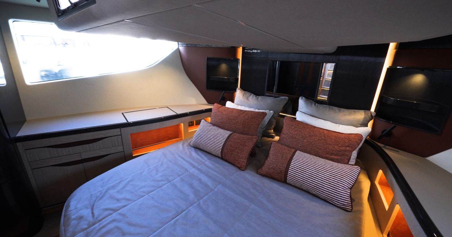 Galeon 520 Fly VIP cabin with forward double bed, hull window and integrated storage