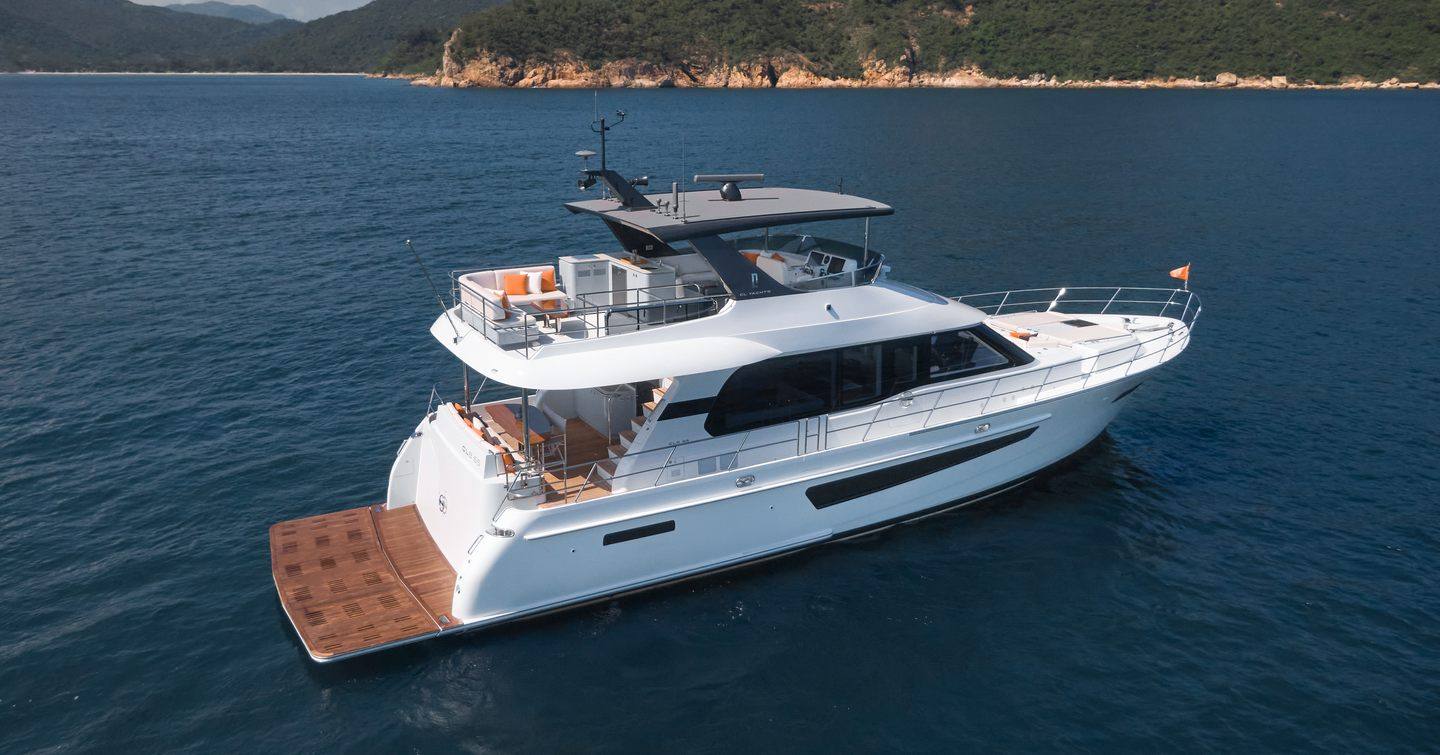 CLB65 Flybridge motor yacht at anchor 