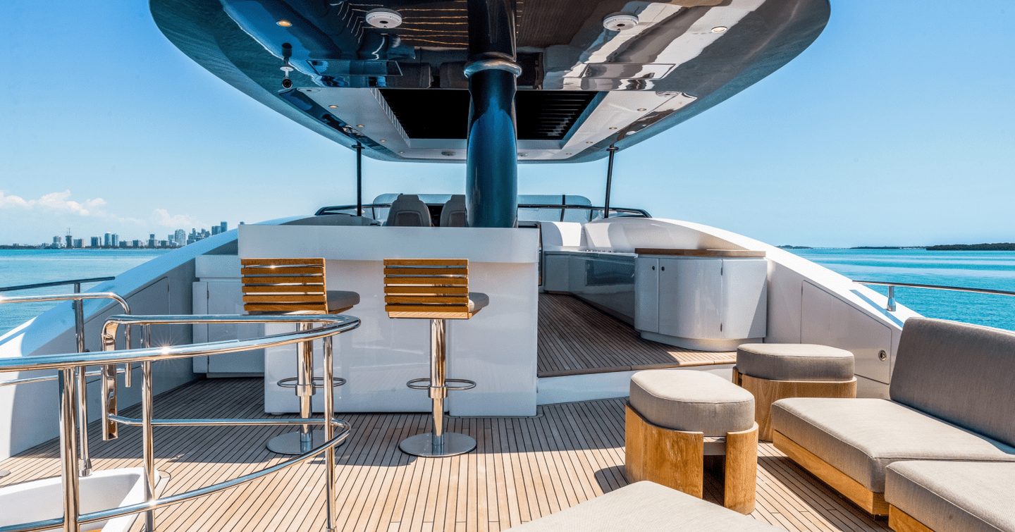 Motor Yacht Equites upper deck with bar and seating