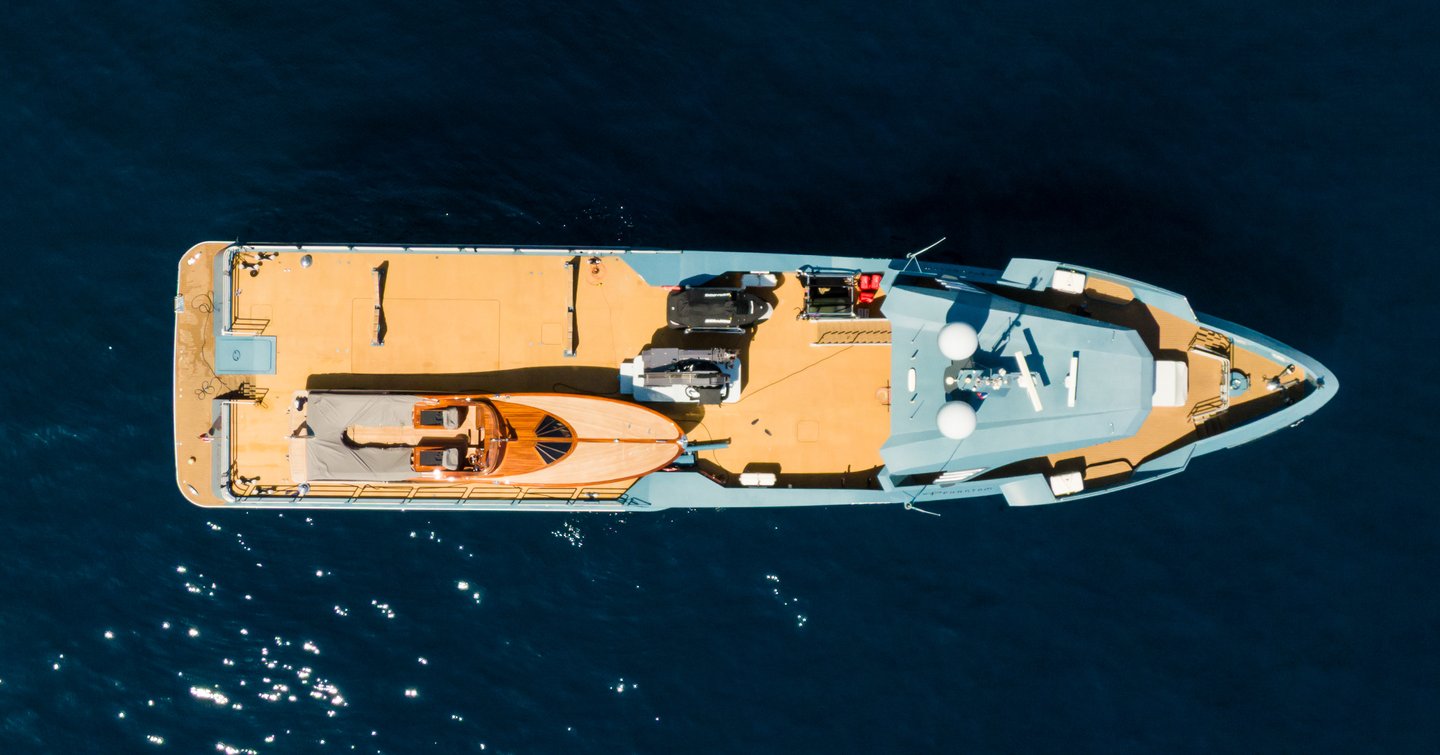Alia Yachts Phi Phantom support yacht at anchor side view 