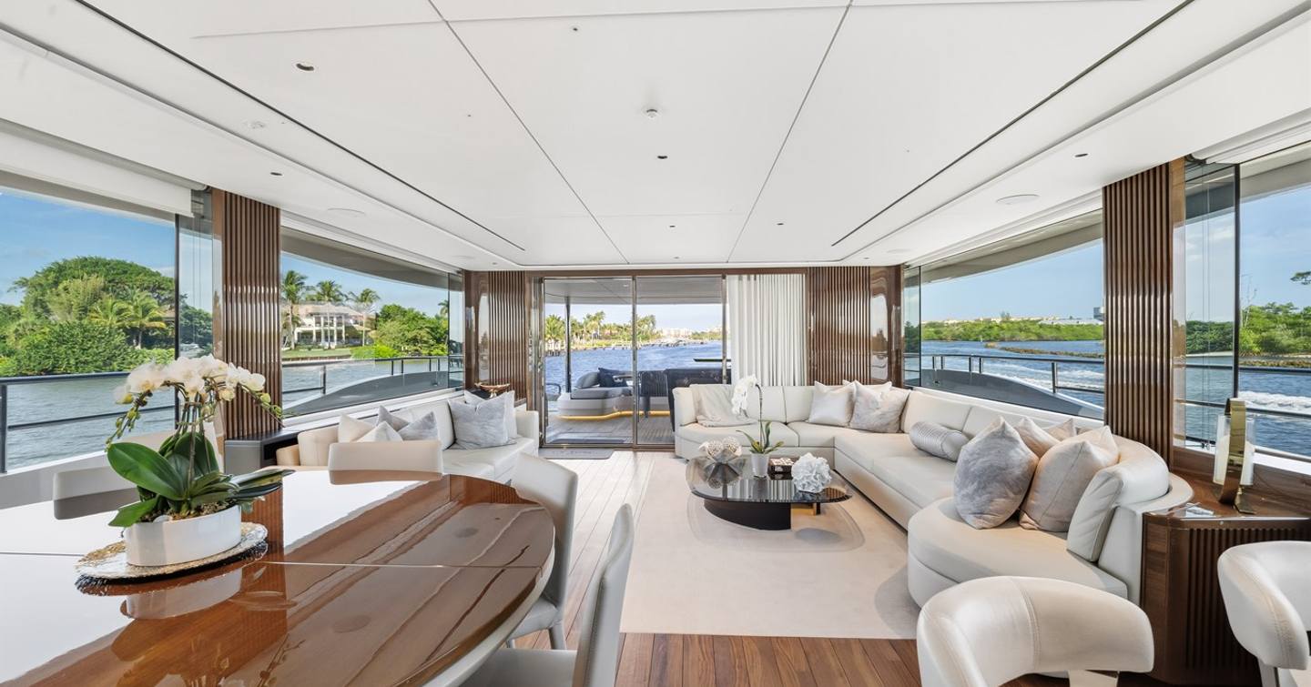Princess Y95 Motor Yacht Just Perfect main salon with l-shaped white sofa 