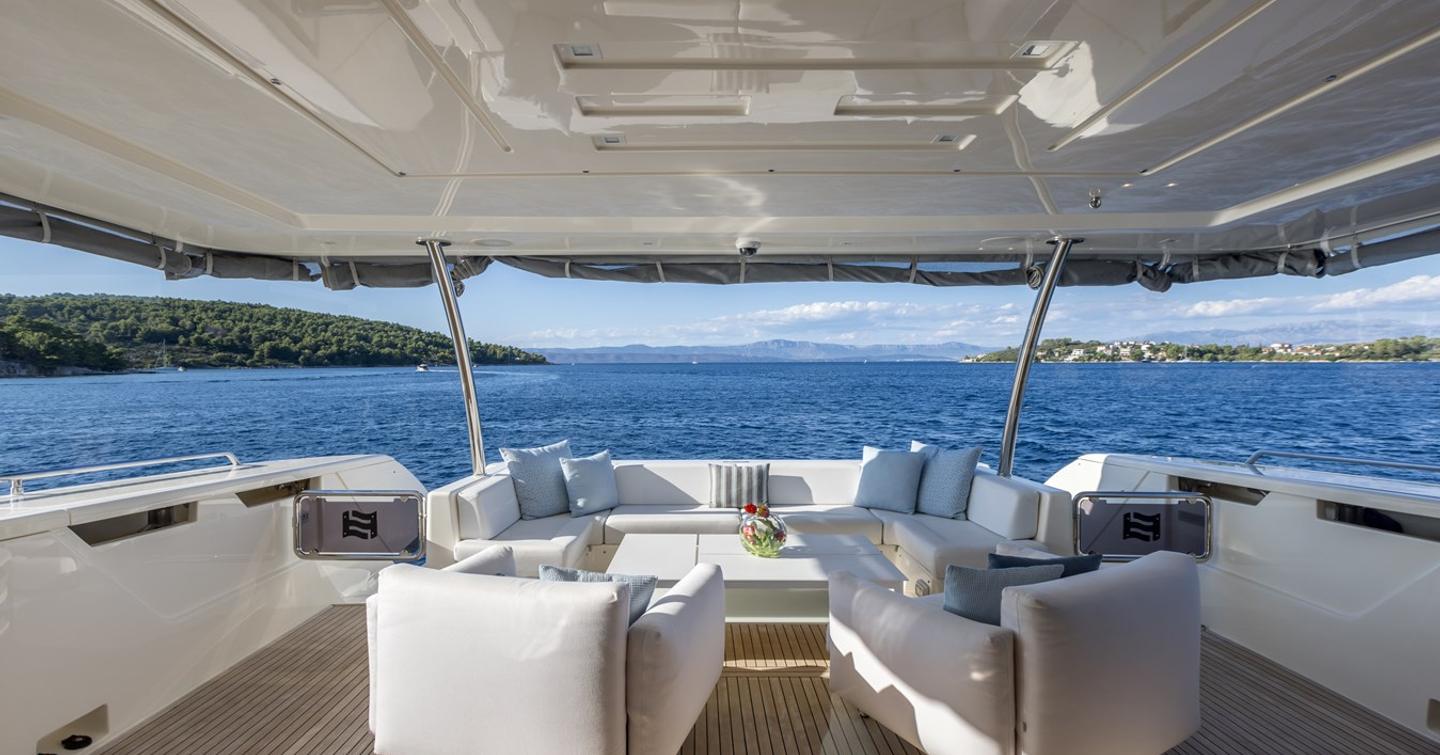 Motor yacht Katariina Xo's aft seating and dining area