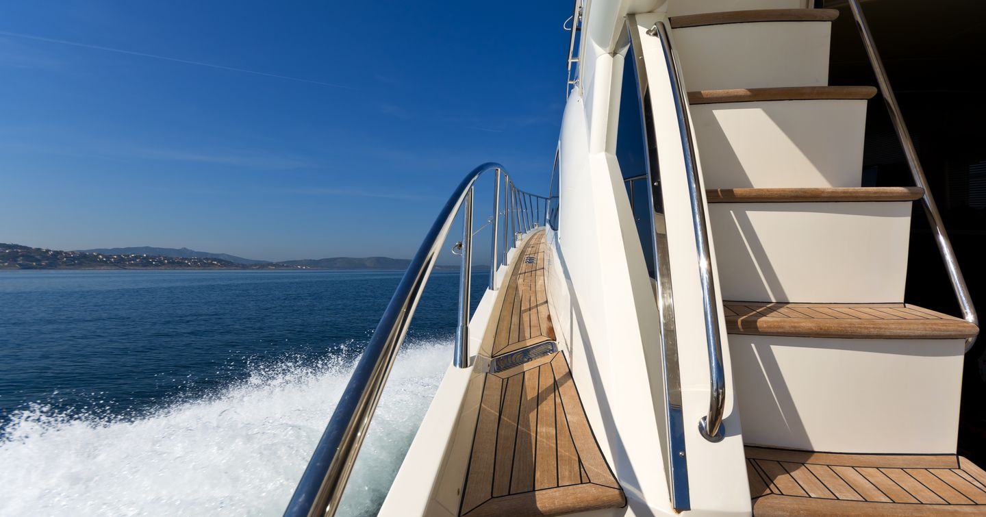 port side deck of motor yacht underway