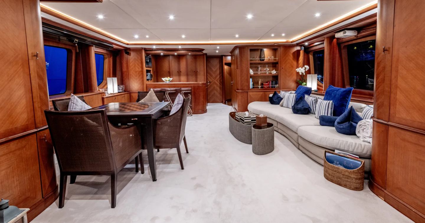 Superyacht Sea Blue'Z  skylounge with games table and white sofa
