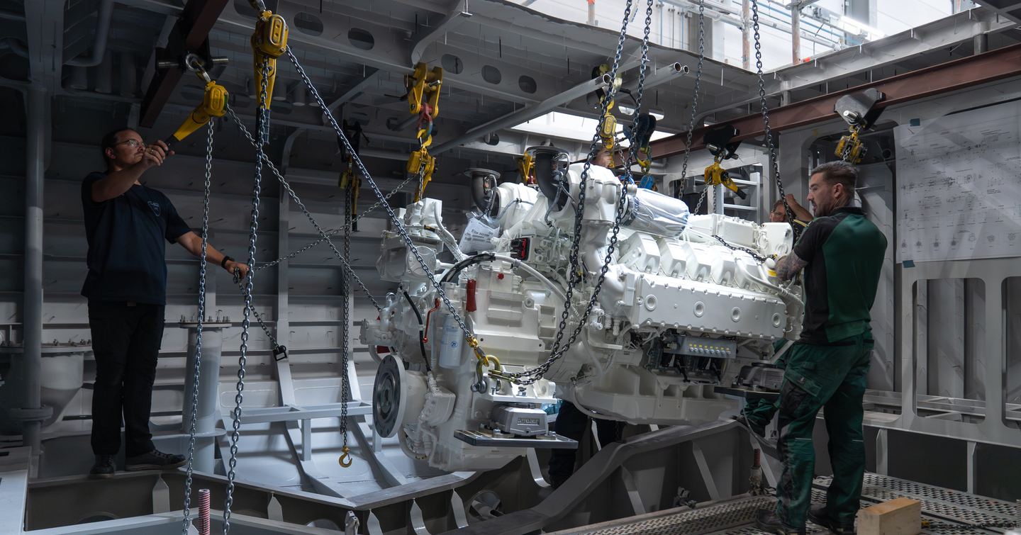 Motor yacht Project Sofia engine being installed in the hull at the shipyard