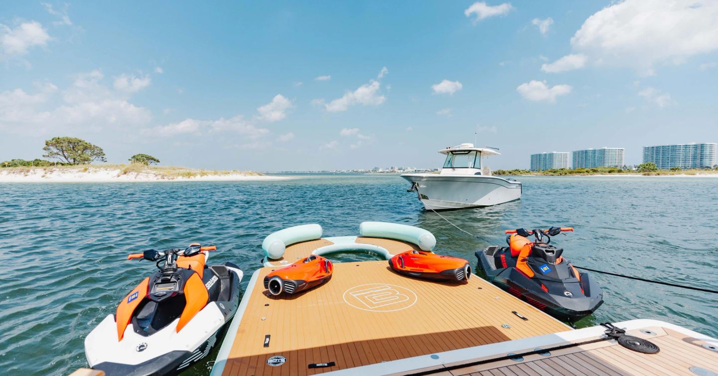 Superyacht Bella Vita extended beach club with jet skis 