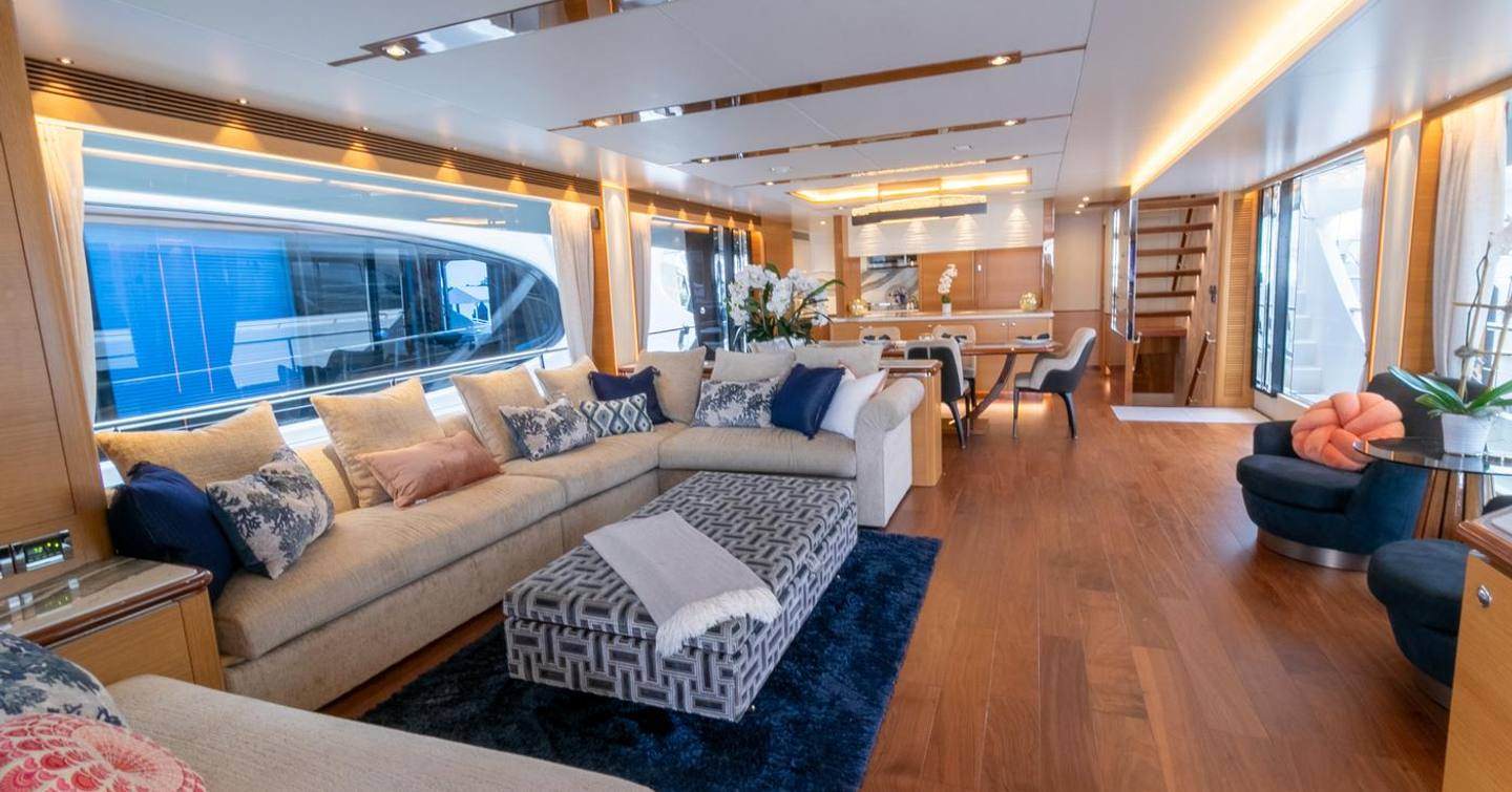 Motor Yacht One More Time main saloon with L-shaped sofa