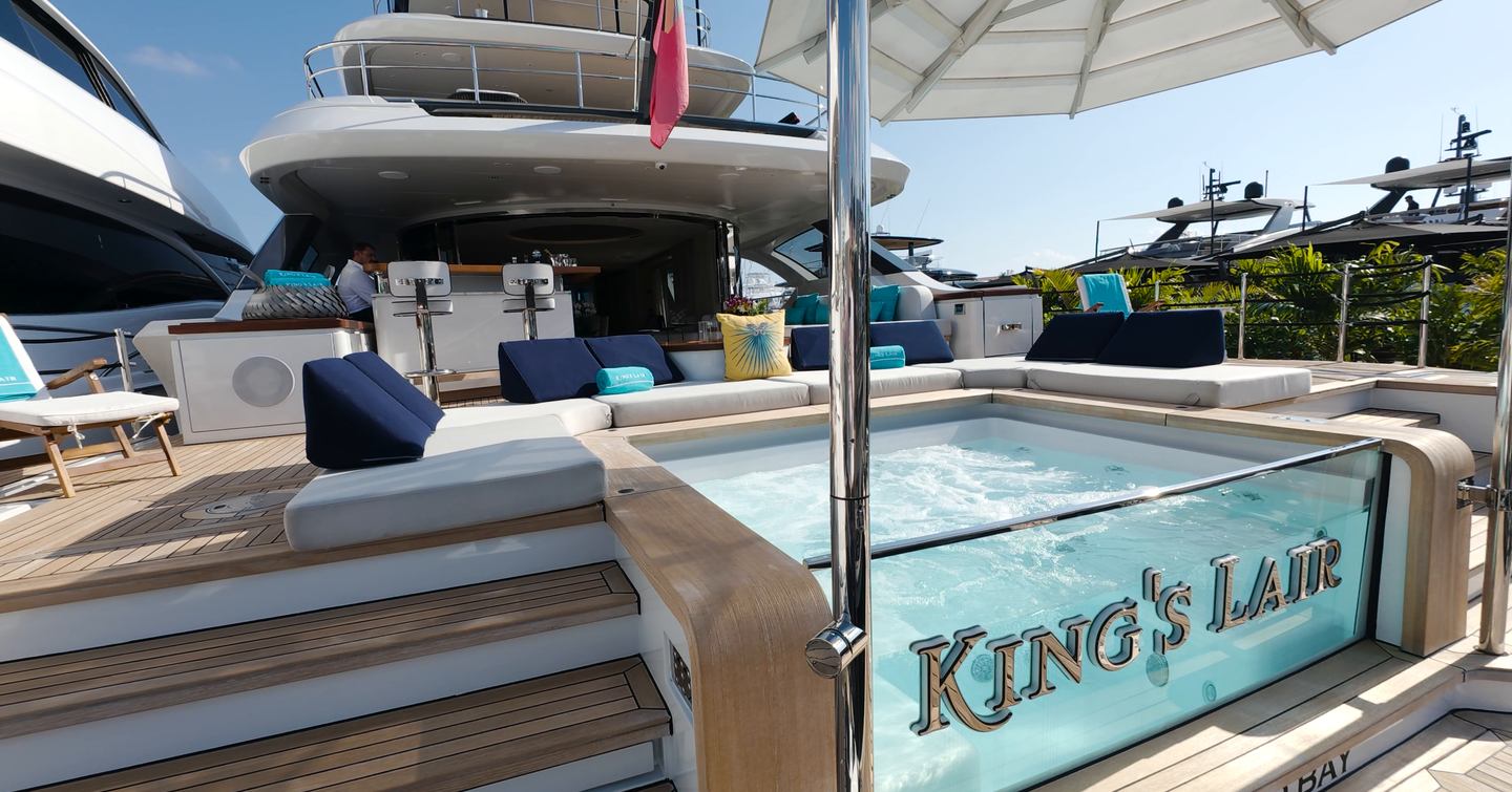 Benetti Oasis 34M Oasis Deck pool with glass transom, integrated lounge seating and direct connection to the beach club area.