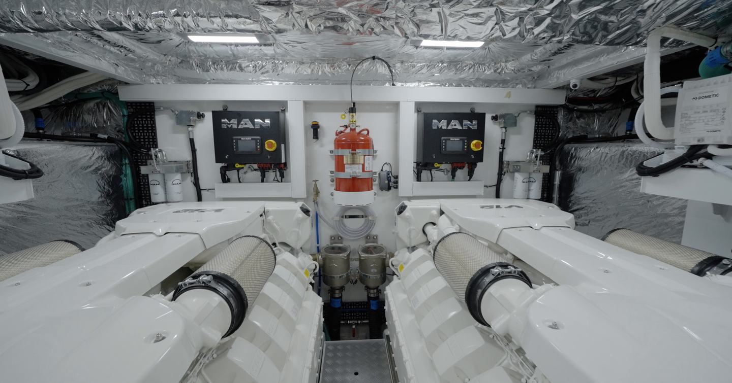 Princess S65 Mk2 engine room with twin MAN V12 engines and insulated machinery space