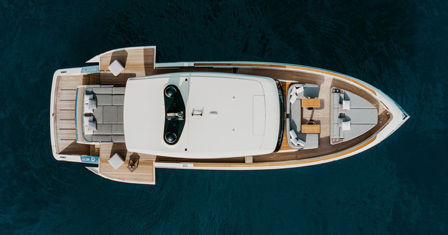 Invictus ST550 motor yacht at anchor aerial view 