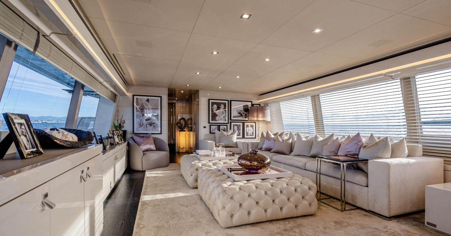 Motor Yacht Yvonne main saloon with cream plush furniture