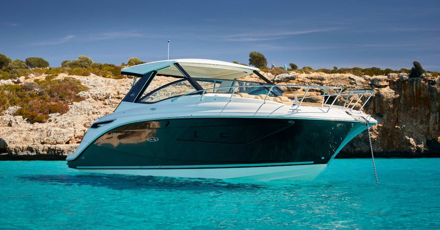 Sea Ray Sundancer 320 at anchor in secluded bay