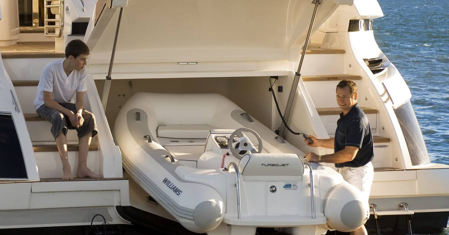 Riviera-6000-Sport-Yacht-Platinum-Edition-Review-aft-garage-with-Williams-tender-stowage