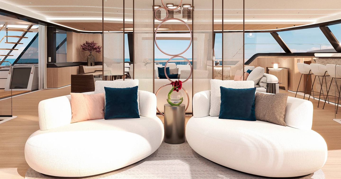 Rendering of Fountaine Pajot FPY120 catamaran saloon with circular white sofas 