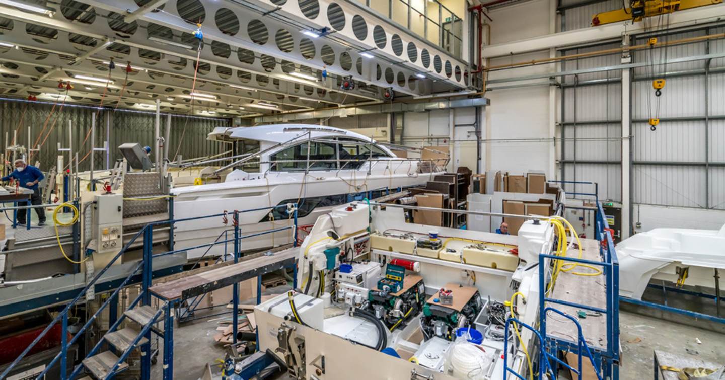 Workers building new fairline models 