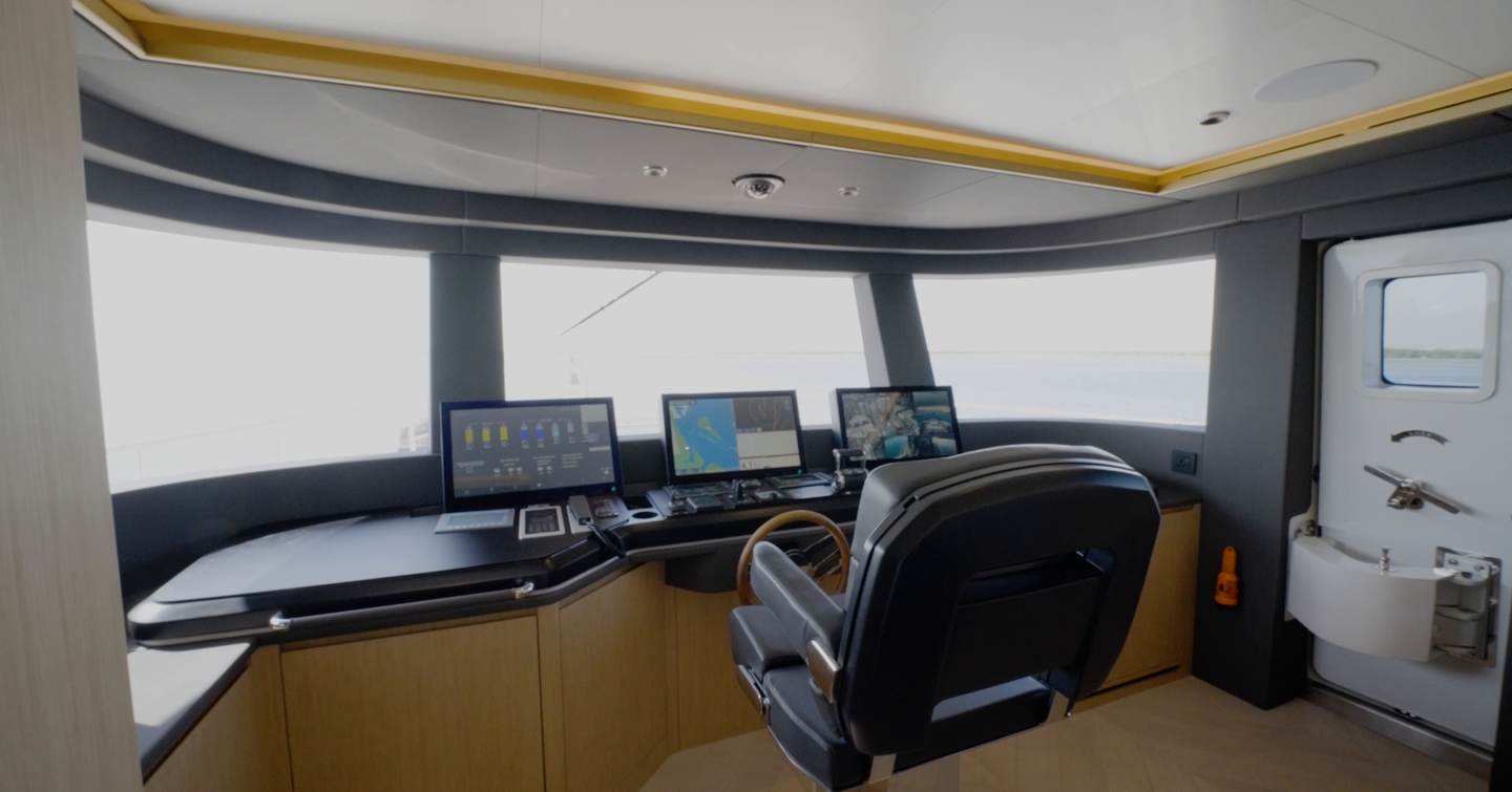 Enclosed bridge aboard the Gulf Craft Majesty 100 Terrace with triple multifunction displays