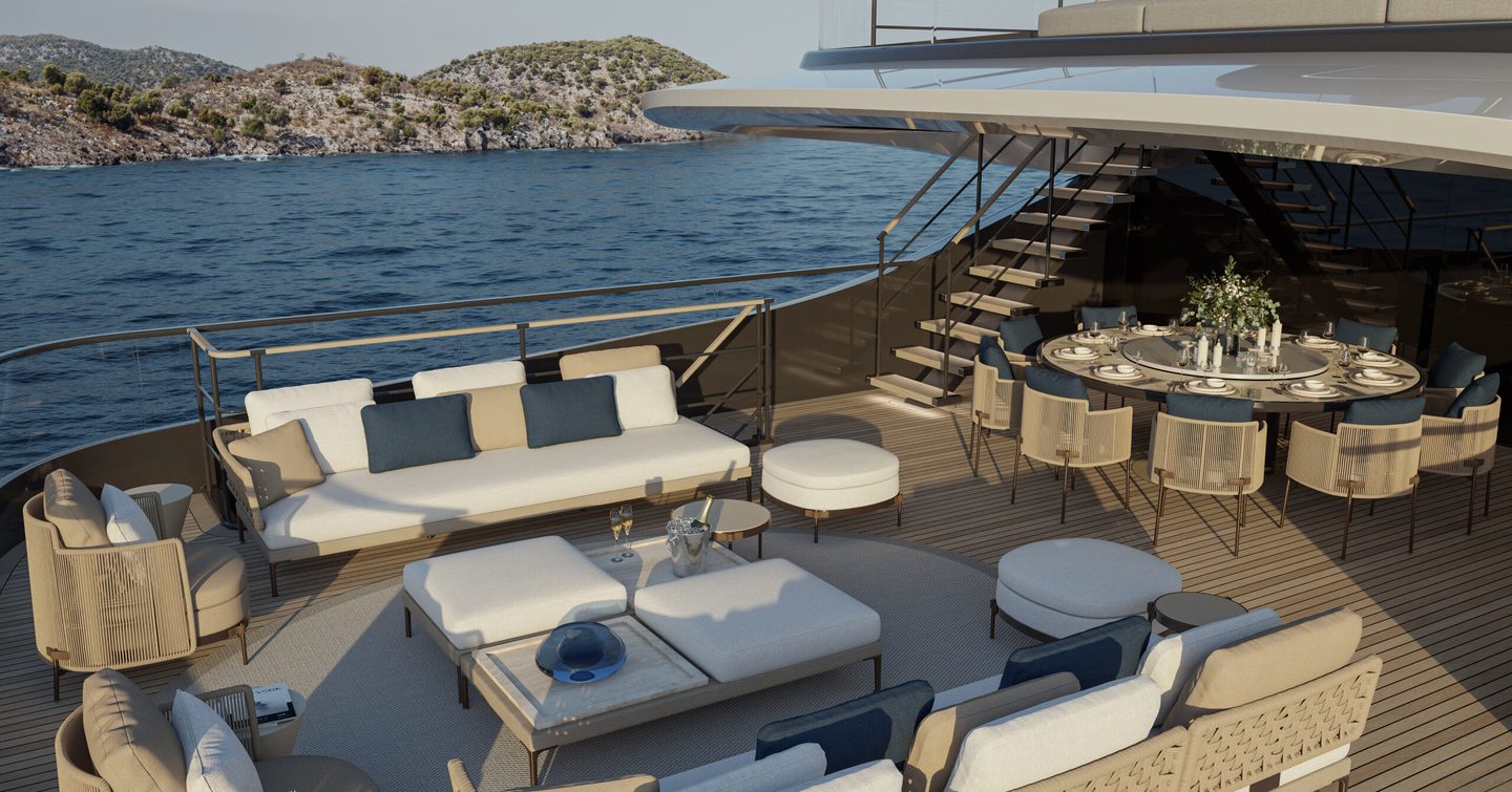 UNICA 45 aft deck with circular dining table and seating area