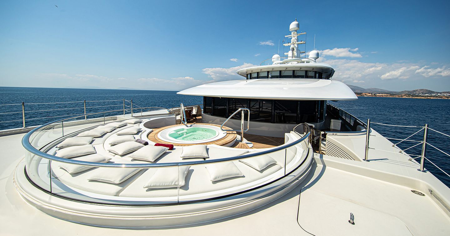 Meridian A on deck Jacuzzi, surrounded by sun loungers.