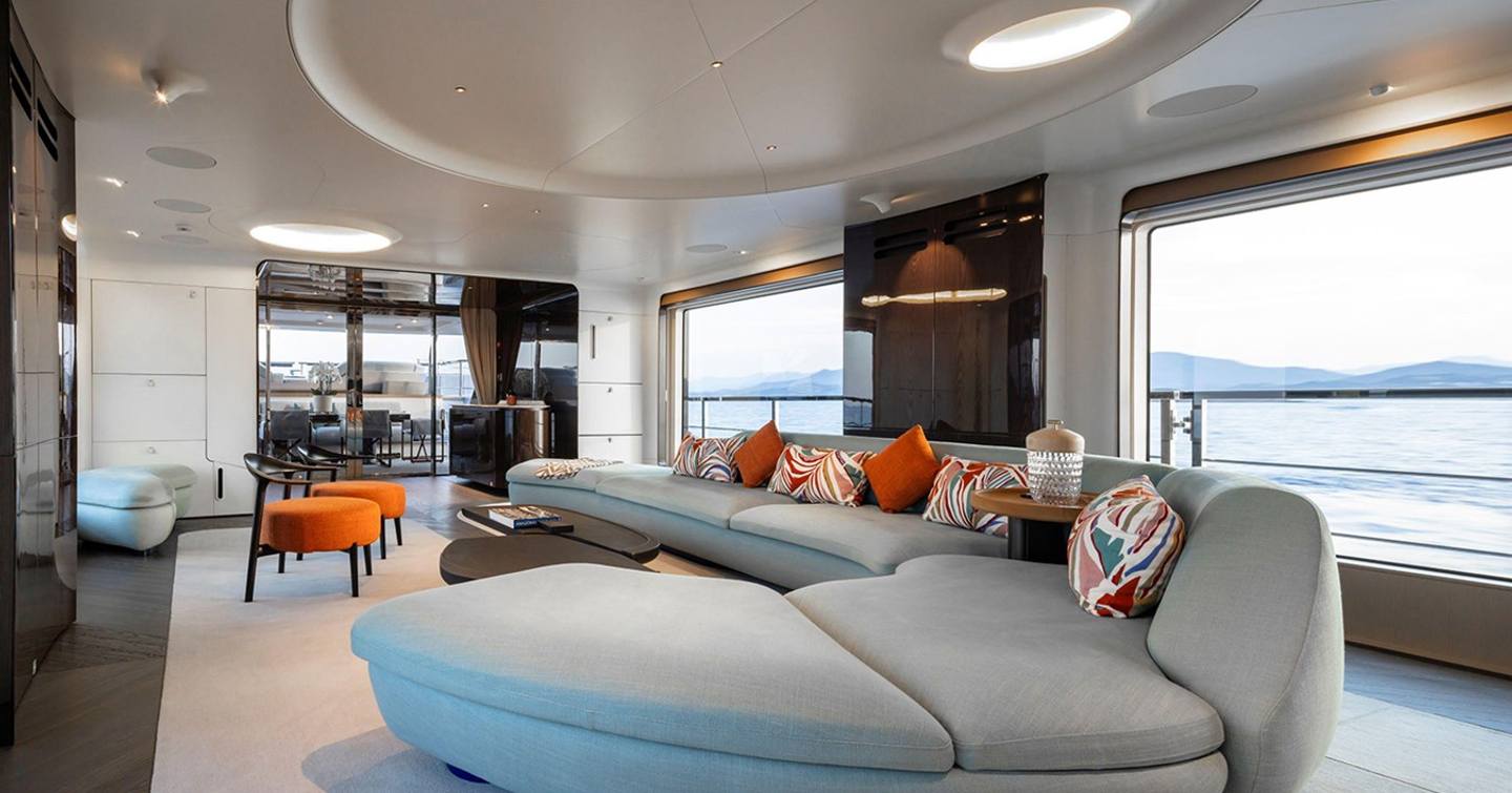 Superyacht Azimut Grande Trideck Tamanya main saloon with curved grey seating