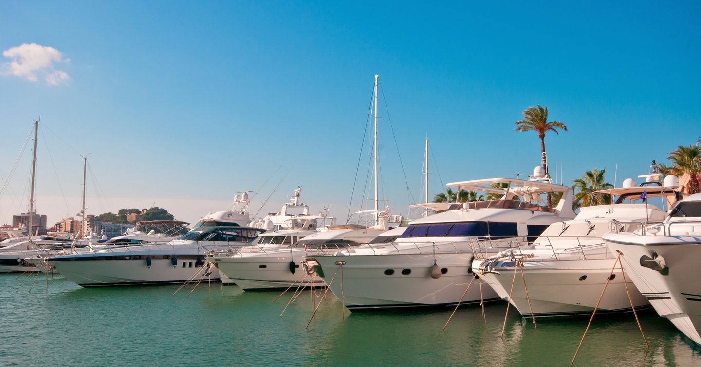 Luxury yachts moored at a marina 