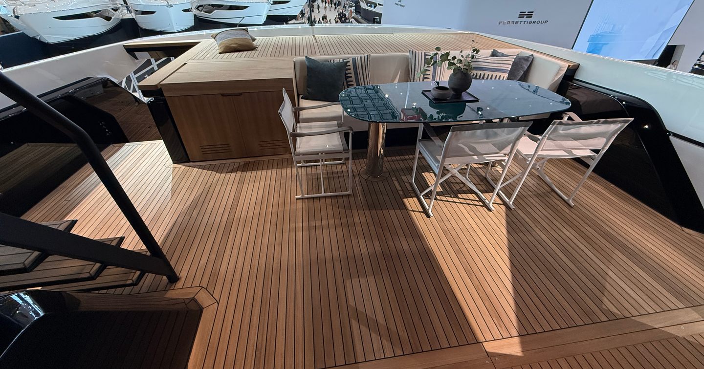Bluegame-BGX83-Review-upper-aft-deck-dining-area-with-table-and-seating