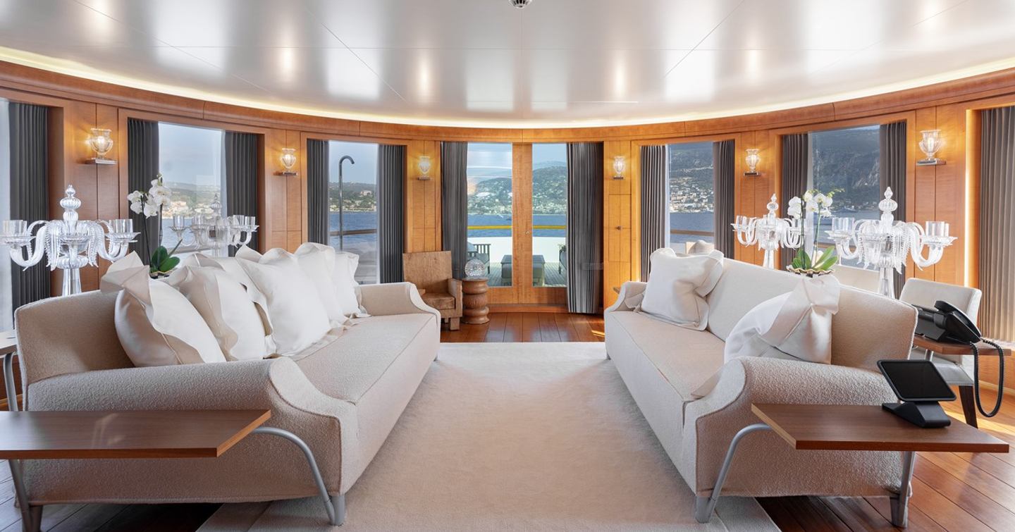 Wedge Too yacht main salon with sofas and sea views
