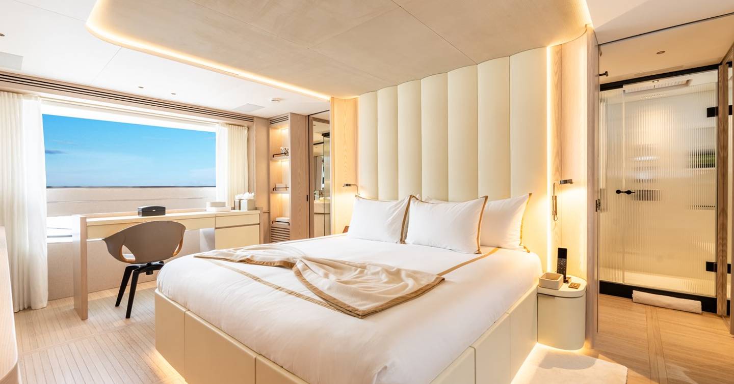 Tranquil master cabin with large bed and sea views on A+ superyacht