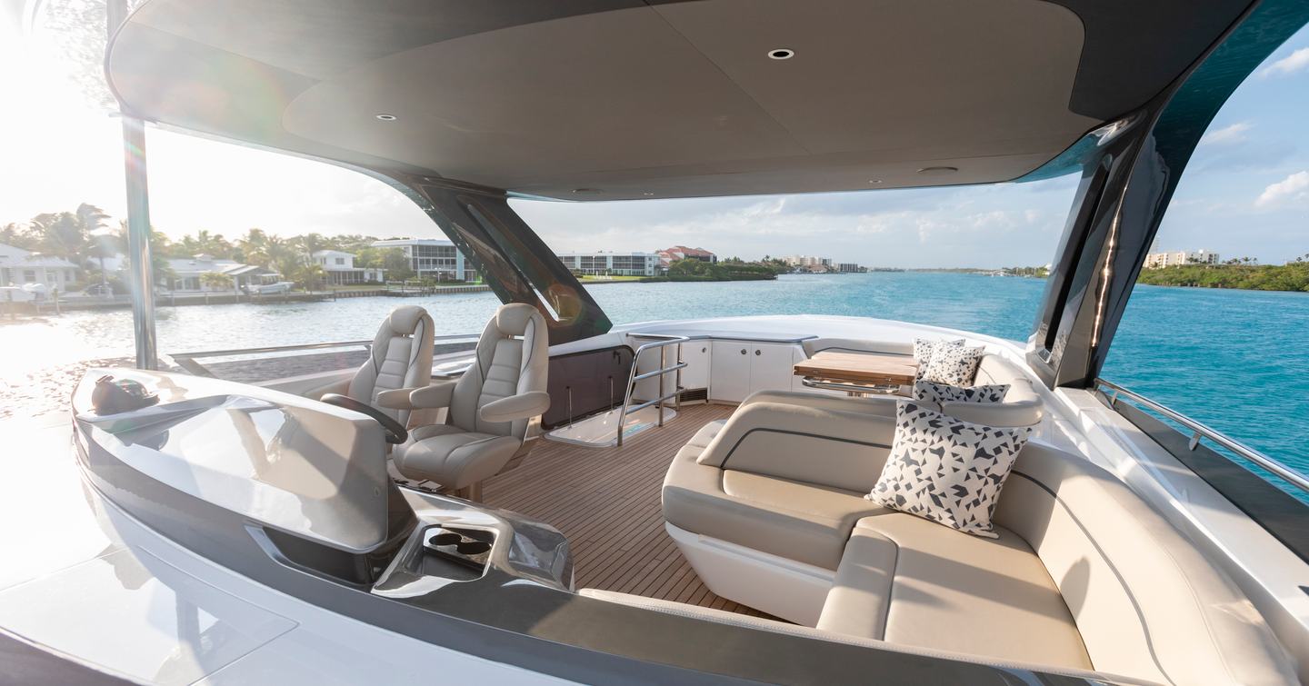 Princess S72 motor yacht flybridge with helm station and L-shaped seating