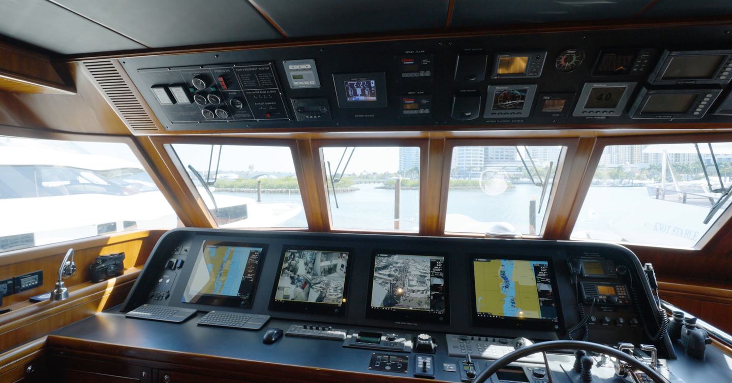 Nordhavn 75 EYF raised pilothouse helm with Garmin navigation displays and full passagemaking controls
