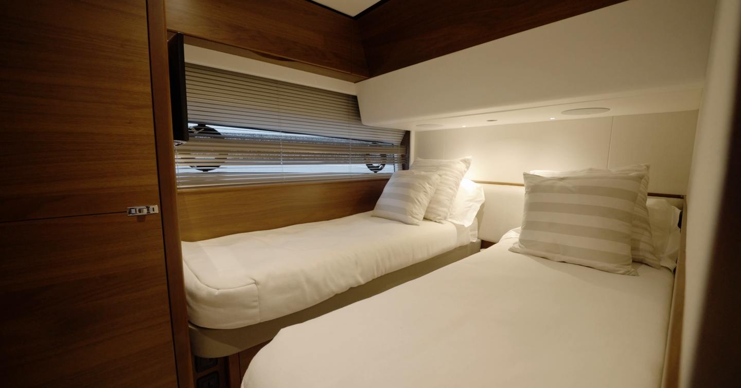 Princess S65 Mk2 twin guest cabin with convertible single berths and hull window