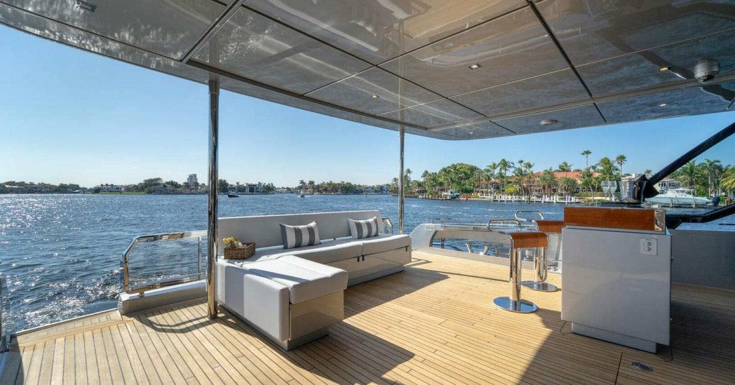 Motor yacht Beyond Beyond main aft deck shaded seating
