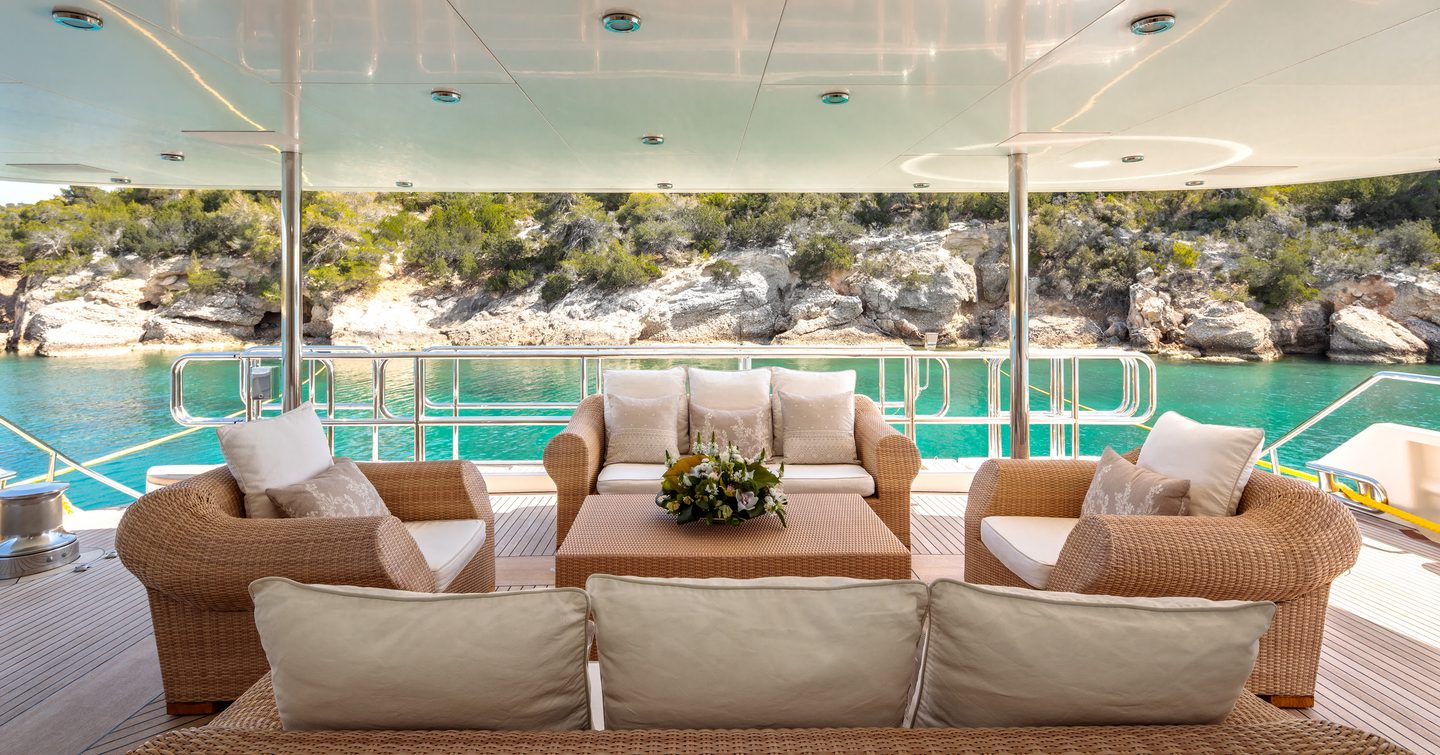 Superyacht Vera's aft shaded seating area