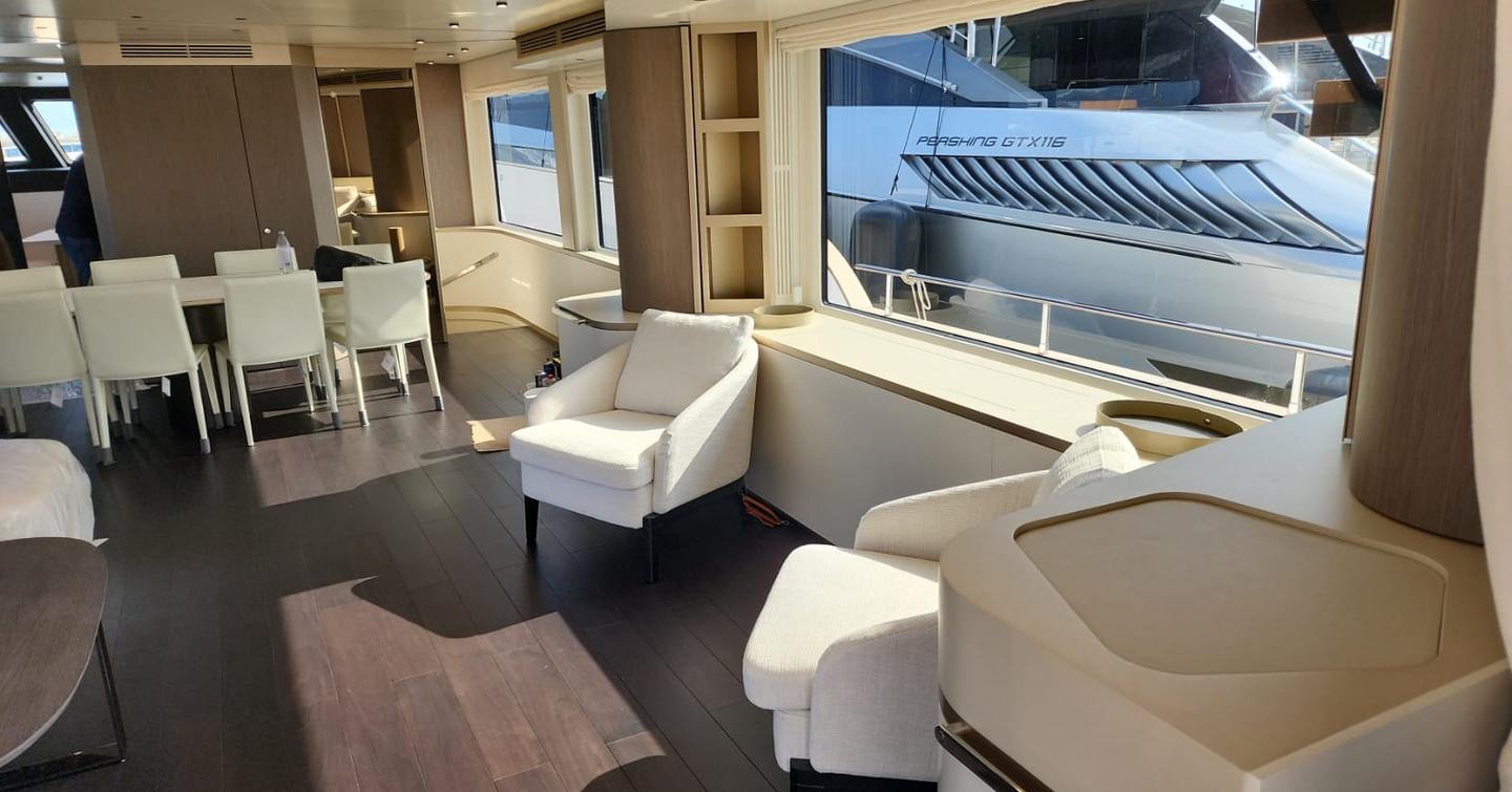 Motor yacht Bayu's indoor seating and dining area 