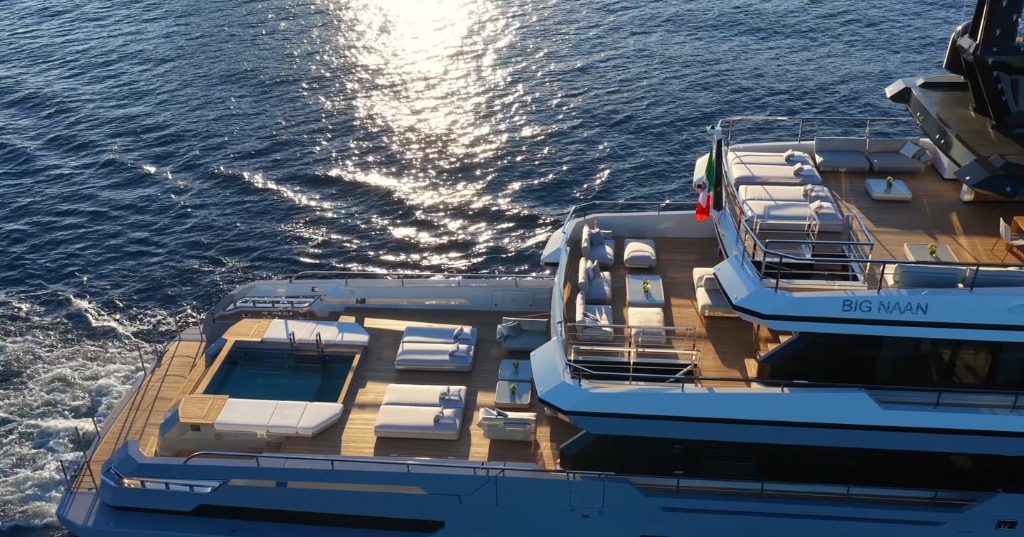 Superyacht Big Naan aft decks with sun loungers and infinity pool 