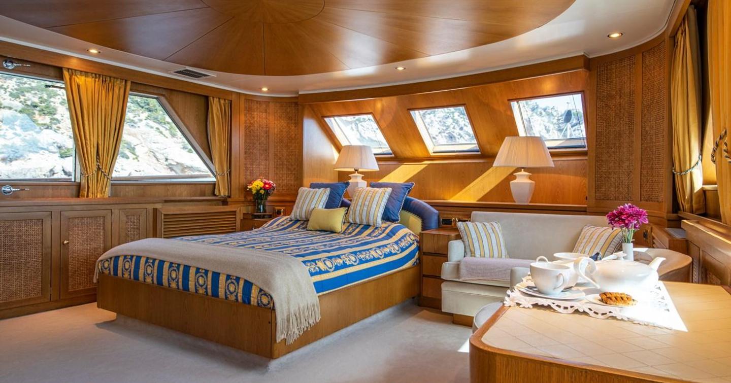 Monaco master cabin with multiple large windows 